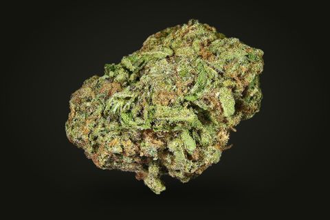 A cured bud of Blue Cheese, leafy and green with orange-brown hairs under a light frost, on a plain black background.