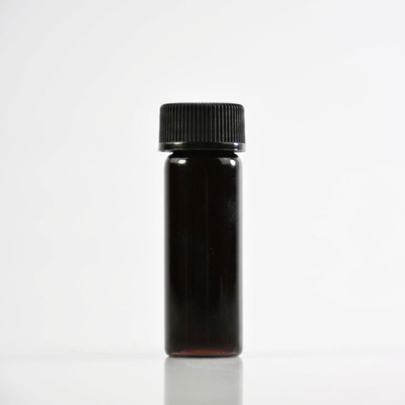 An unlabelled dark amber vial with a black ribbed screw cap, photographed on a white background.