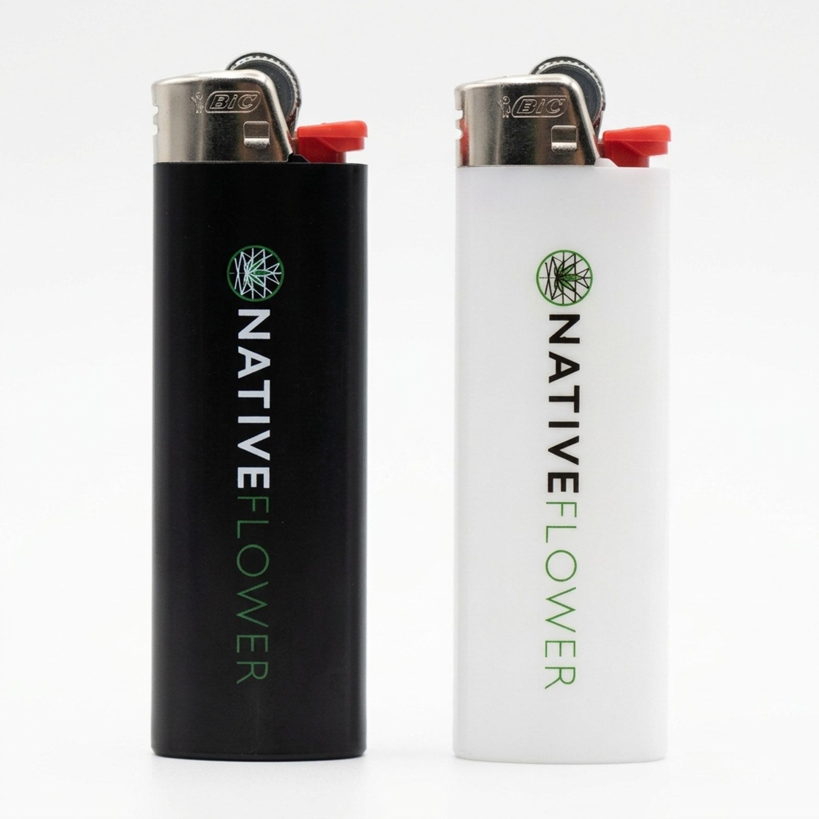 A black and a white Native Flower lighter on a white background, each printed with the Native Flower logo and a vertical wordmark.