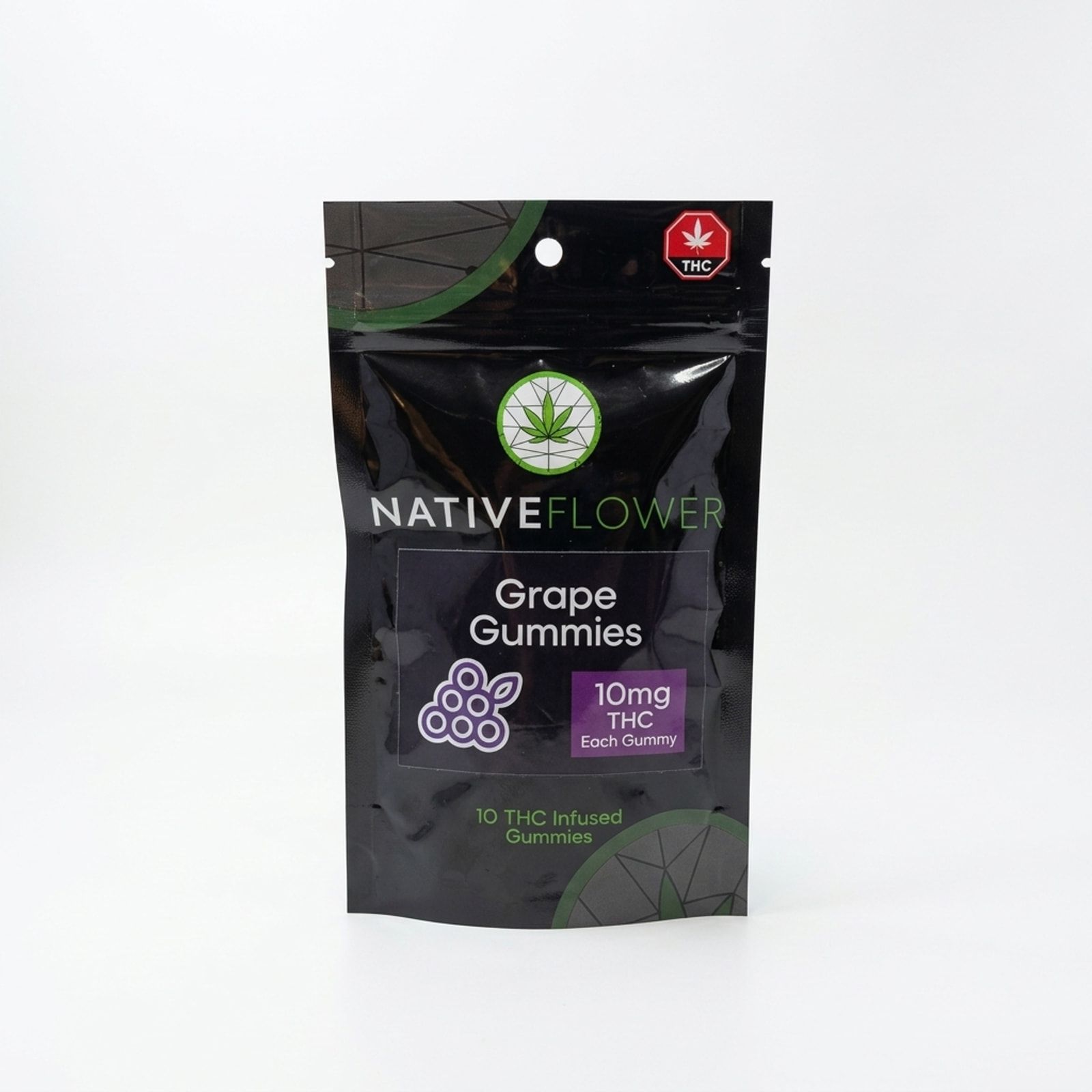 A black Native Flower grape gummies pouch with a purple label panel, standing upright on a white background.