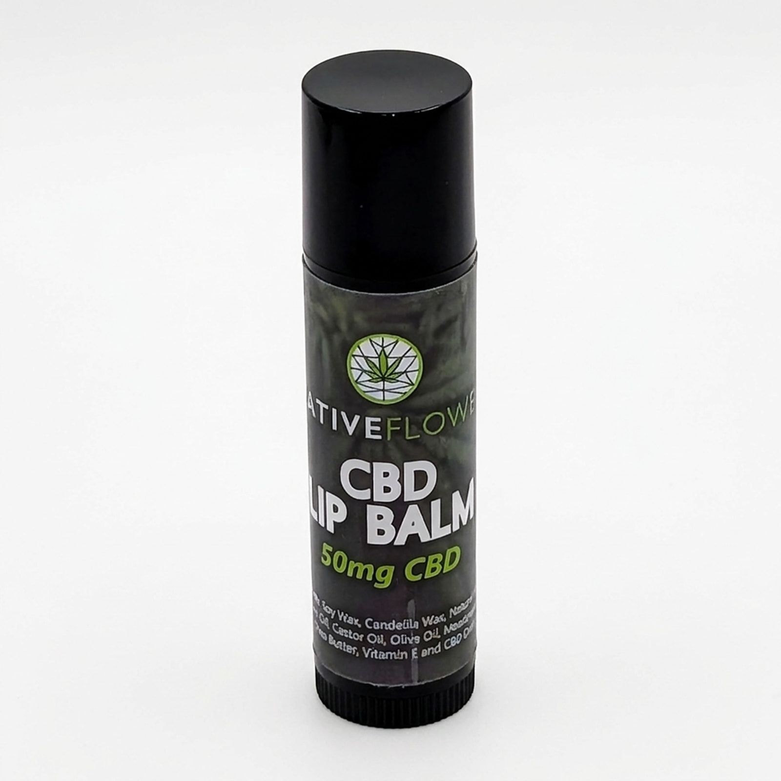 A Native Flower CBD lip balm tube with a black cap, standing upright on a white background.