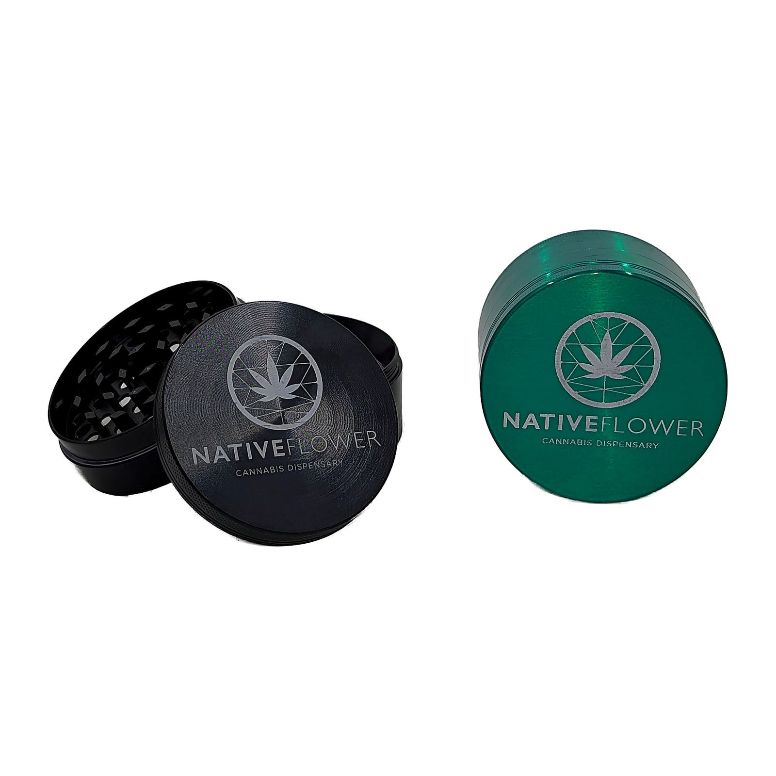 A black Native Flower metal grinder open beside a closed green one, both etched with the Native Flower logo.