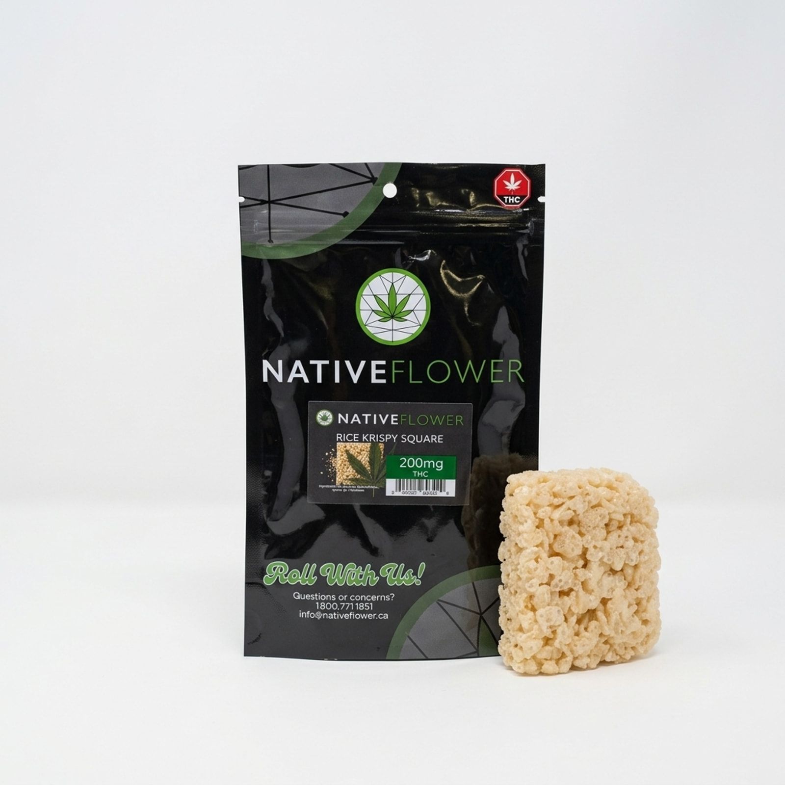 A Native Flower rice krispy square propped against its black pouch on a white background.