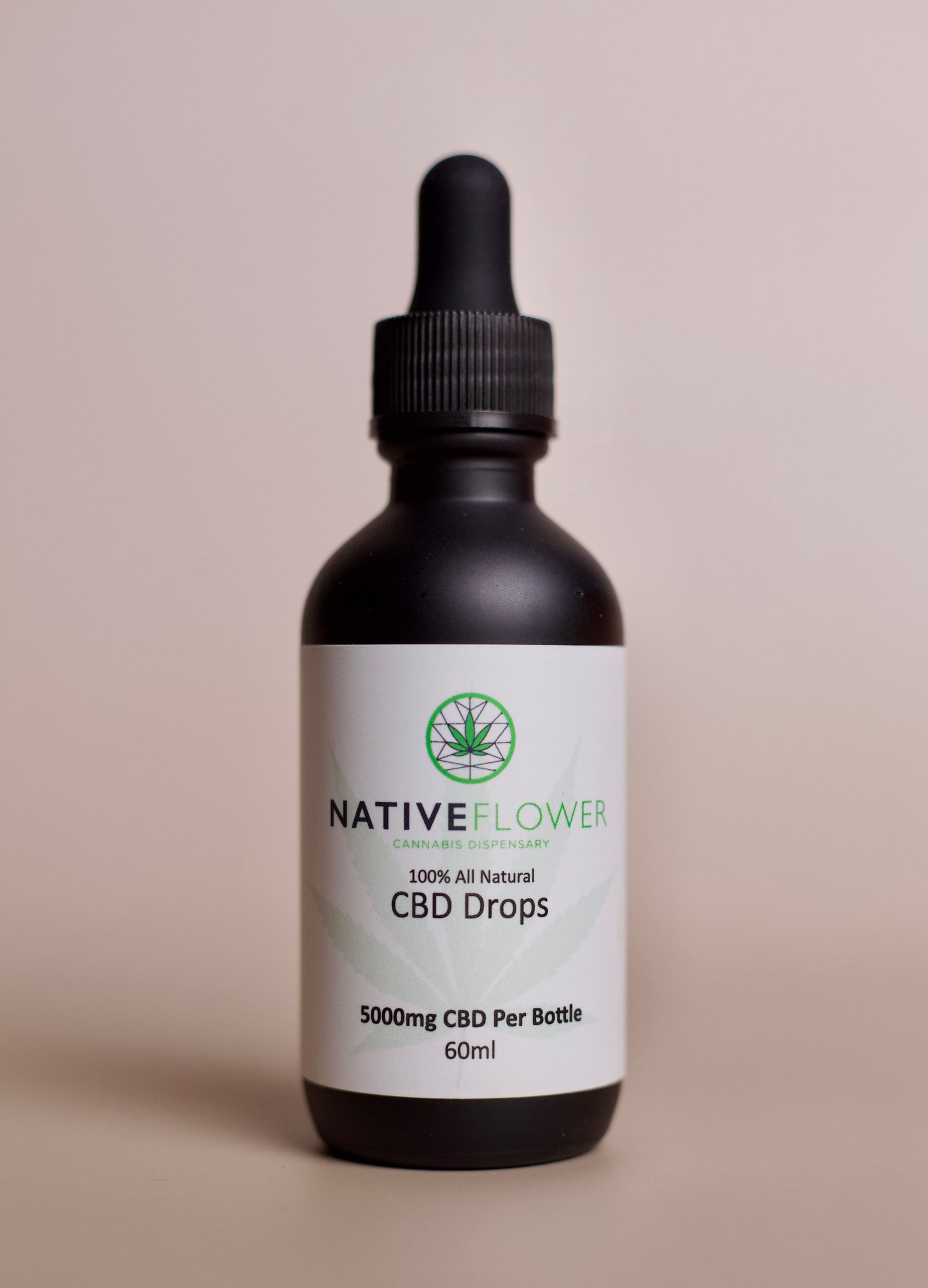 The strongest bottle of Native Flower CBD drops, label facing forward.