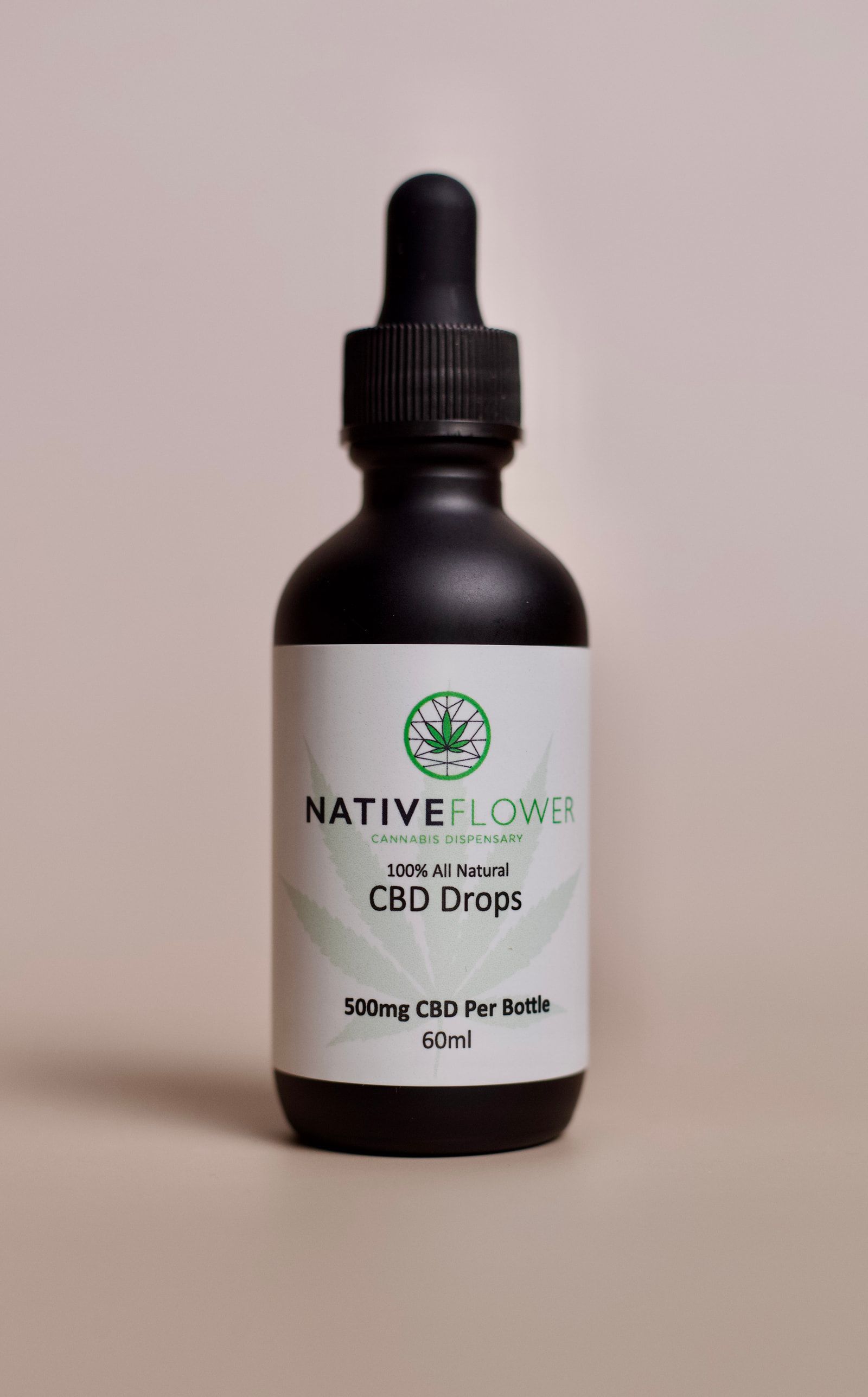 The lightest bottle of Native Flower CBD drops, label facing forward.