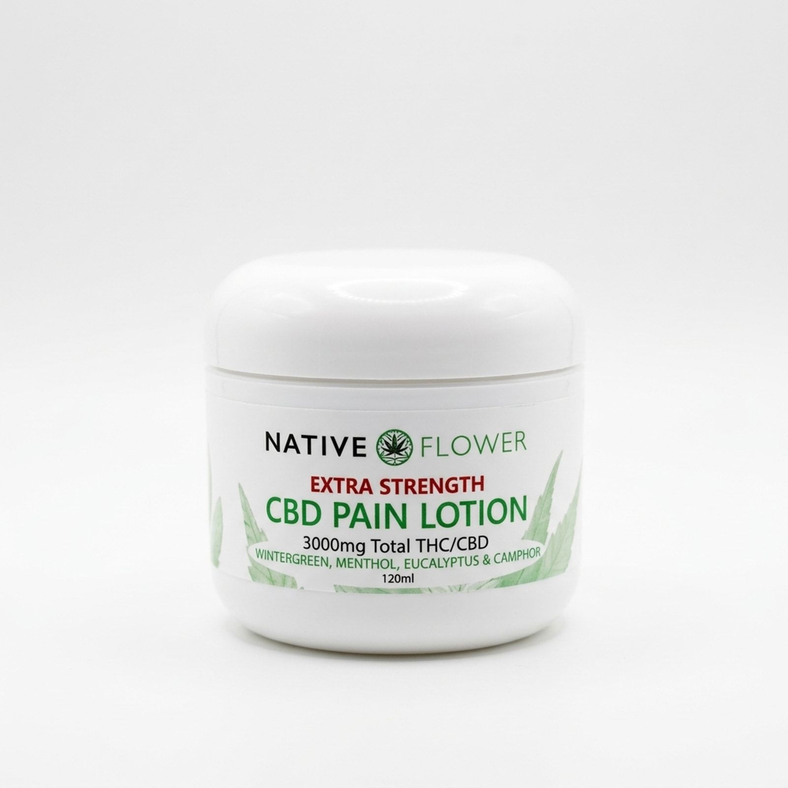 A white jar of Native Flower topical lotion with a green-and-red label, front facing, on a white background.